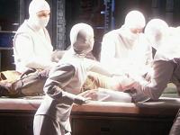 The pilot of the Adaris getting medical treatment back on Atlantis